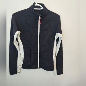 Lululemon form fitting Jacket. Black/White . Measurements in pictures.